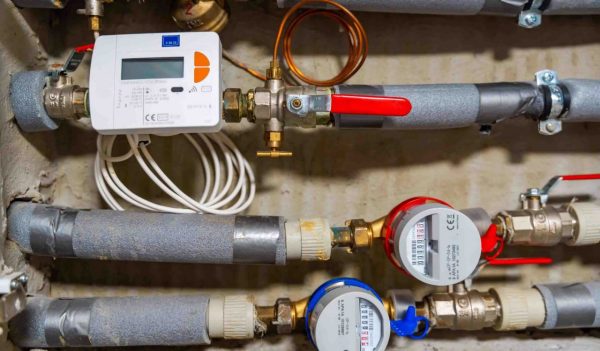 Smart water and heat meters with remote data transmission installed in a European utility system.