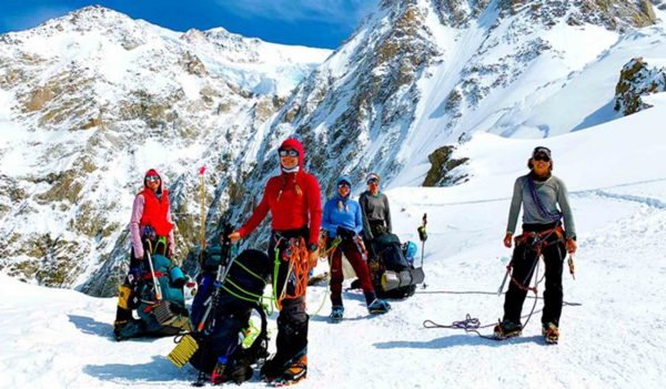 Stephanie Espinoza, Stantec staff, hiking Mount Denali with other military veterans