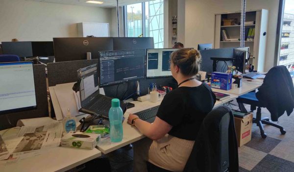 Georgia Mkandla sitting at her desk.