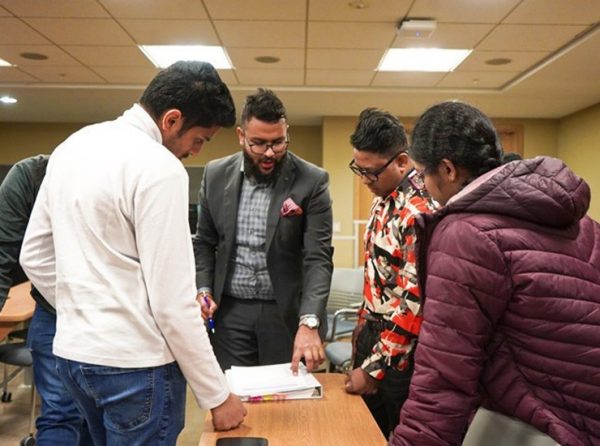 Aleem Nawla connects with students during the Student Open House.