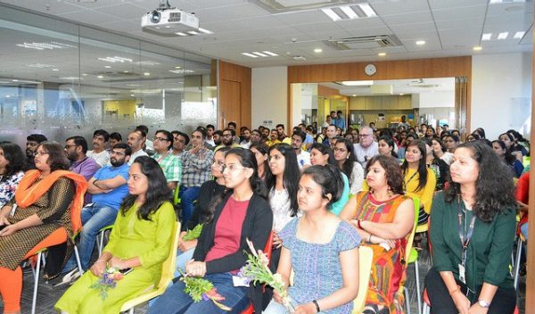 A audience listening to a speaker