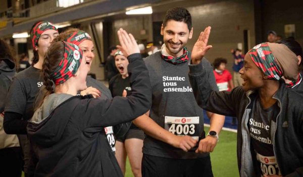 Stantec Quebed SIT team members congratulating each other.