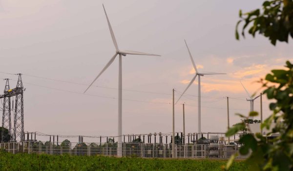 Windmills and electrical substation, high-voltage substation and wind turbines.