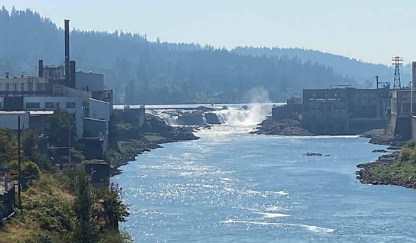 A river with industrial buildings