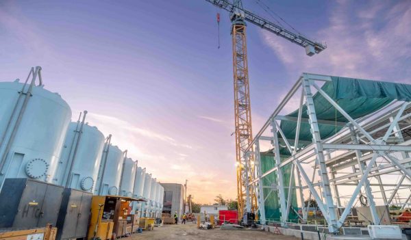 Facility infrastructure construction including storage tanks.