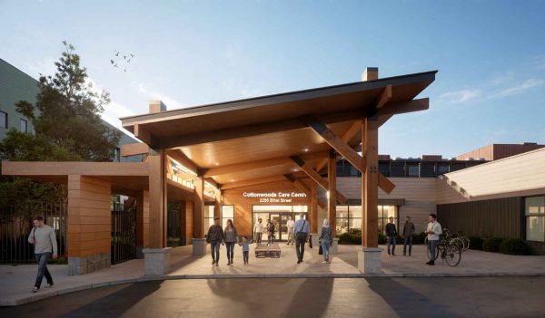 Rendering of main entrance with people, sidewalk, and plantings