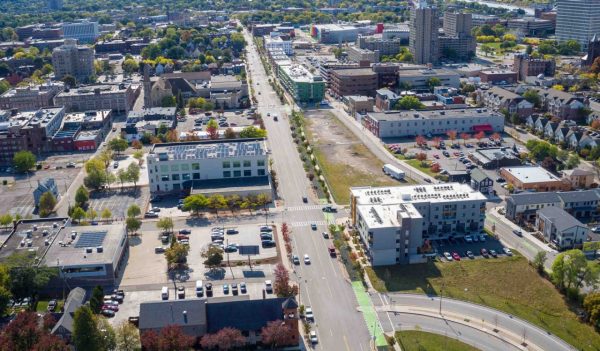 Overhead view of a city roadway with buildings