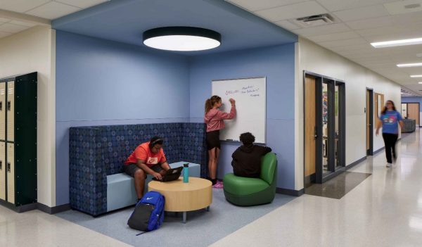 Corridor with small meeting area with seating