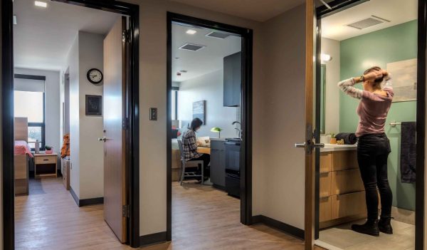 View of Student residence from the entrance showing the shared washroom and two separate rooms.