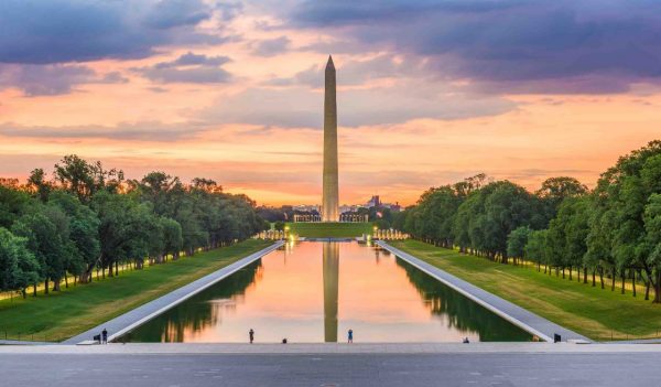 Washington Monument on the Reflecting Pool in Washington, D.C. at dawn.